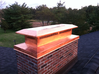 Before and after chimney cap replacement in Deer Park, NY