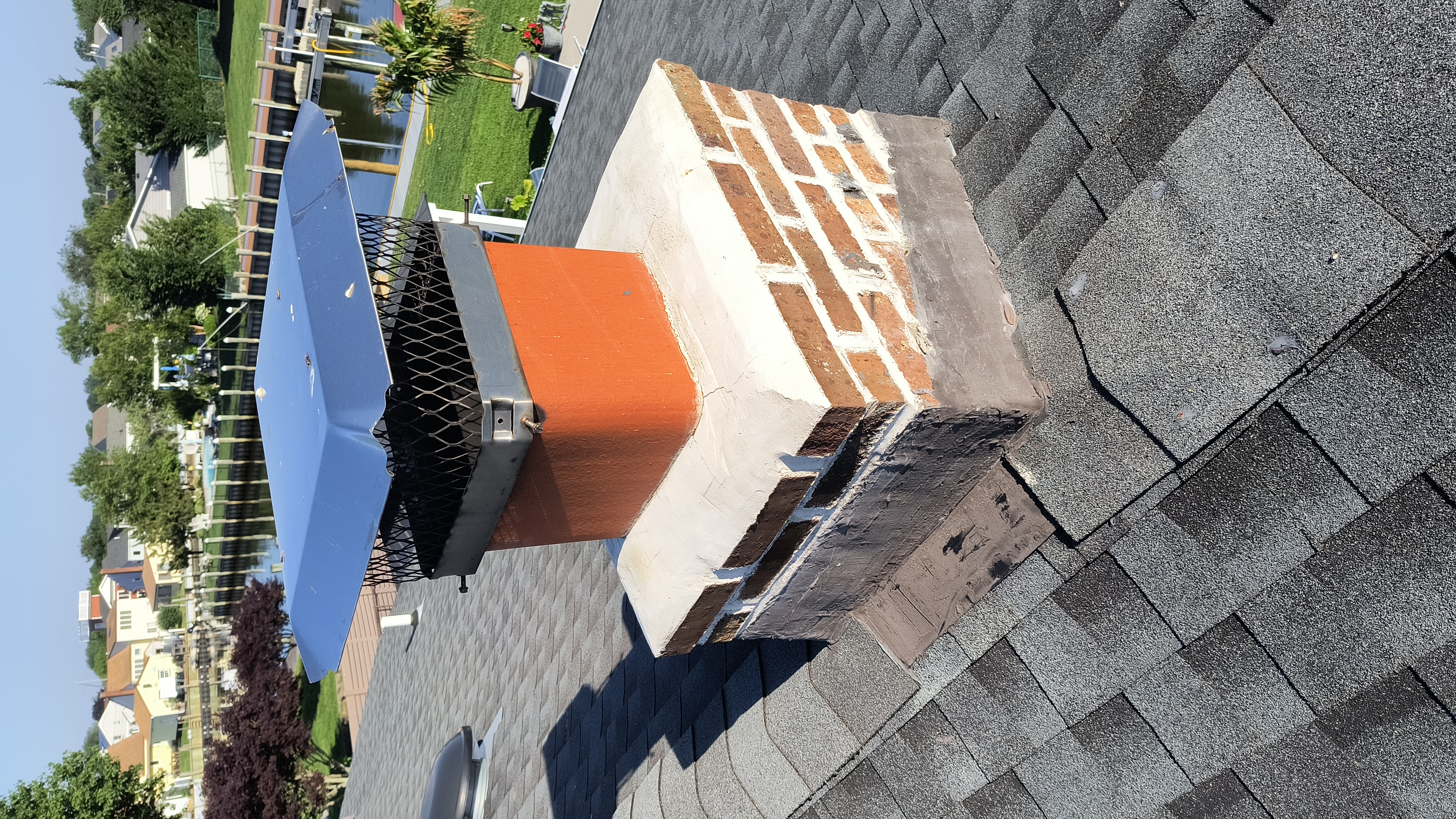 Full chimney masonry rebuild and restoration in Deer Park, NY