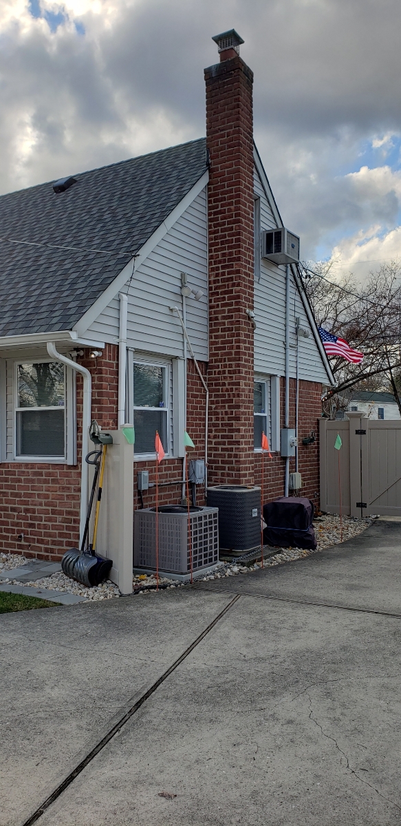 Professional chimney repointing restoring brick joints in Deer Park, NY