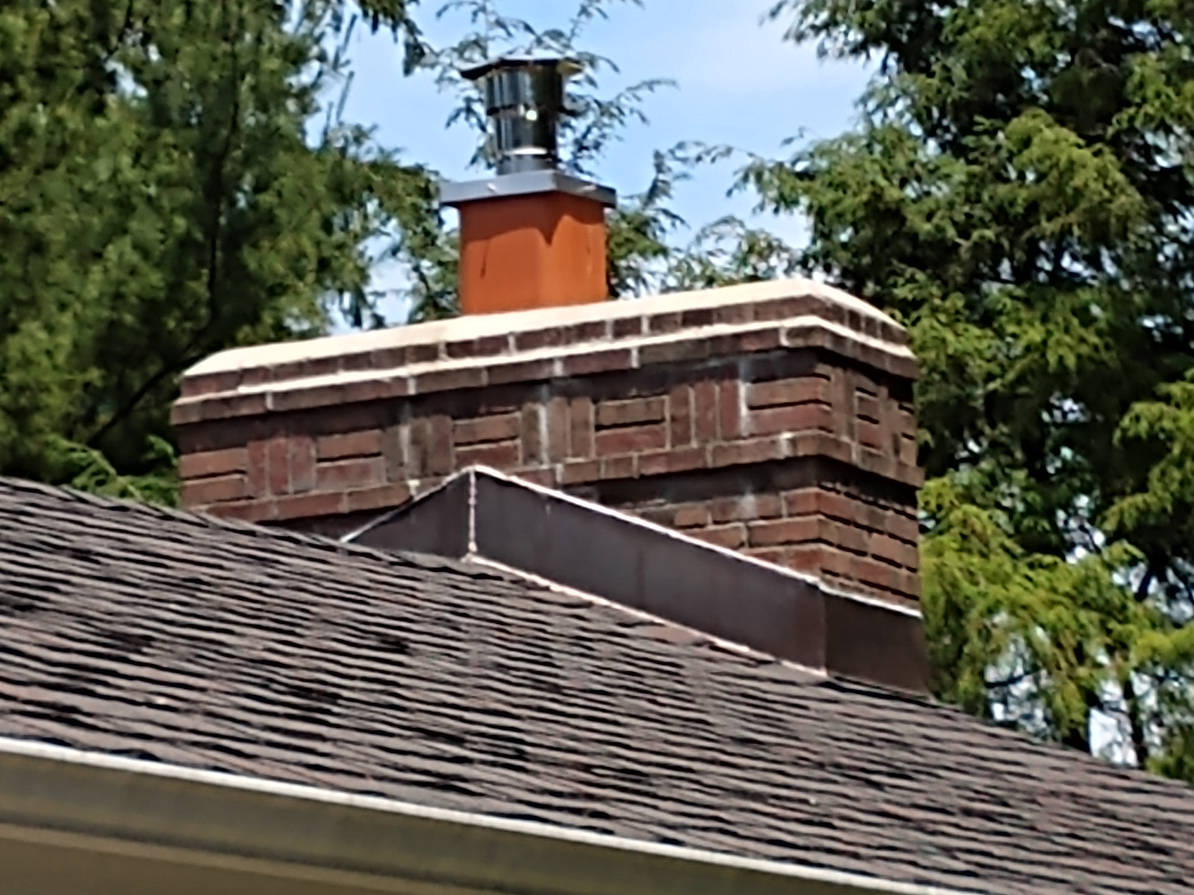 Stainless steel chimney cap with animal guard in Deer Park, New York